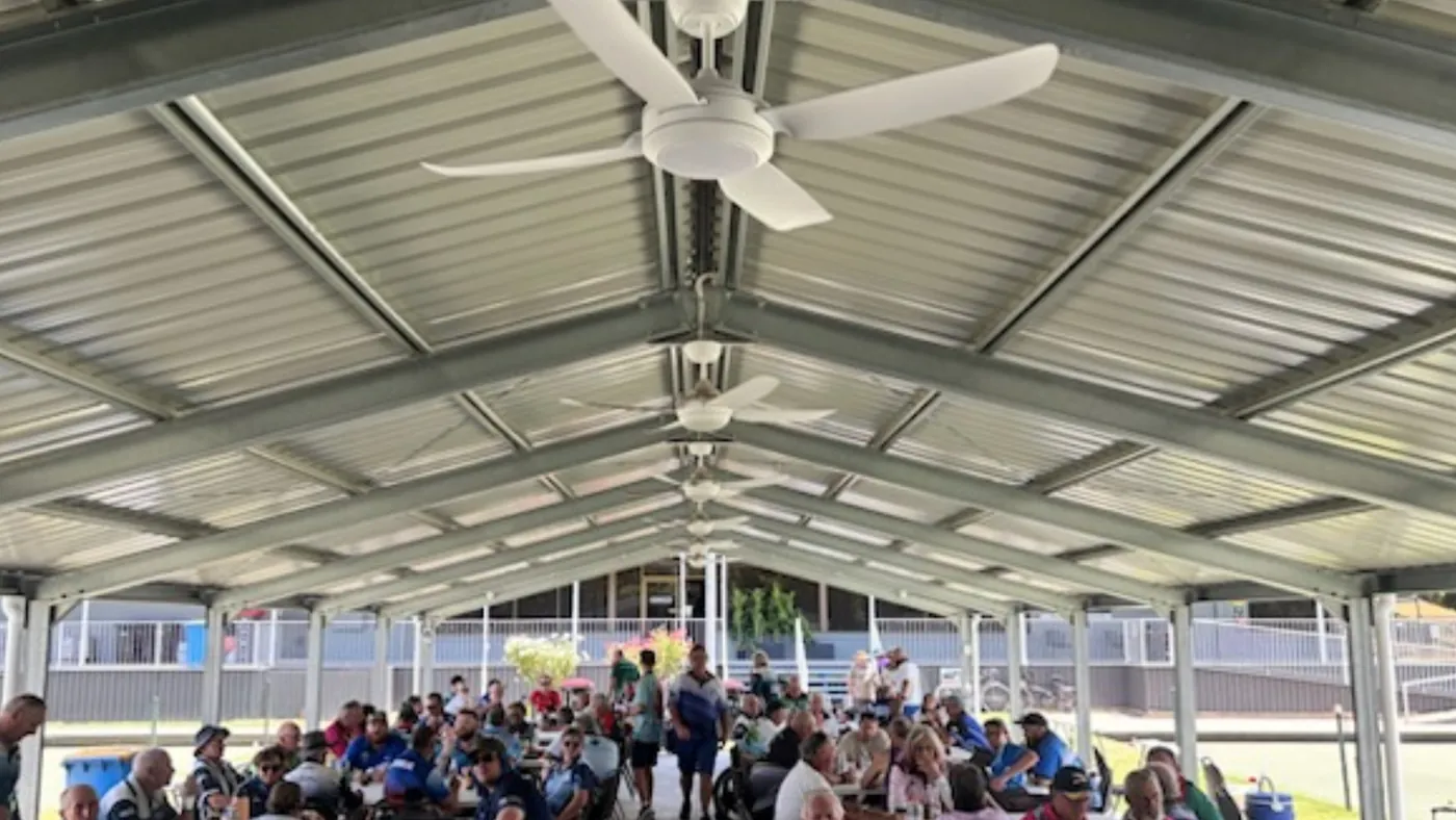 Members gathered under the covered pavilion at the Benalla Bowls Club